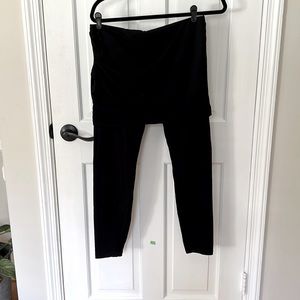 Black CAbi leggings with attached shirt. Shirring on right side